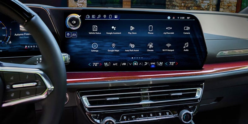 Interior dashboard view featuring the large touchscreen infotainment system.
