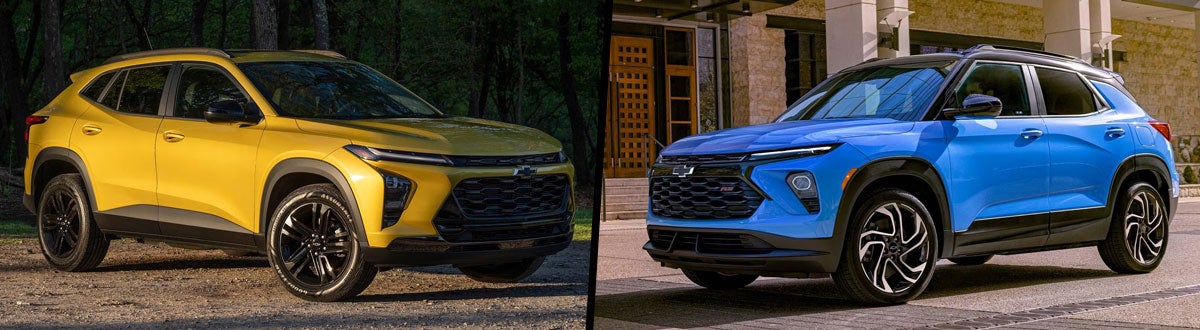 Two Chevy Trax SUVs, one yellow with black accents in a forest, one blue with black accents by a modern building.